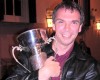David Lancaster clasping the winners' trophy at Malton